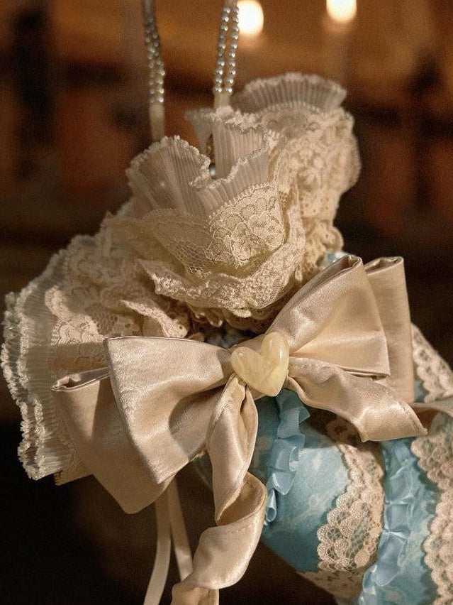 BLOOD SUPPLY Cream Beige Rococo Piped Floral Top Handle Drawstring Women's Handbags